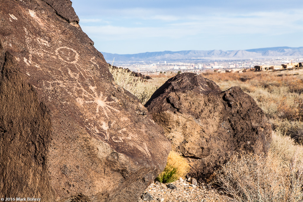 Petroglyph and city, Mesa Prieta, Petroglyph National Monument