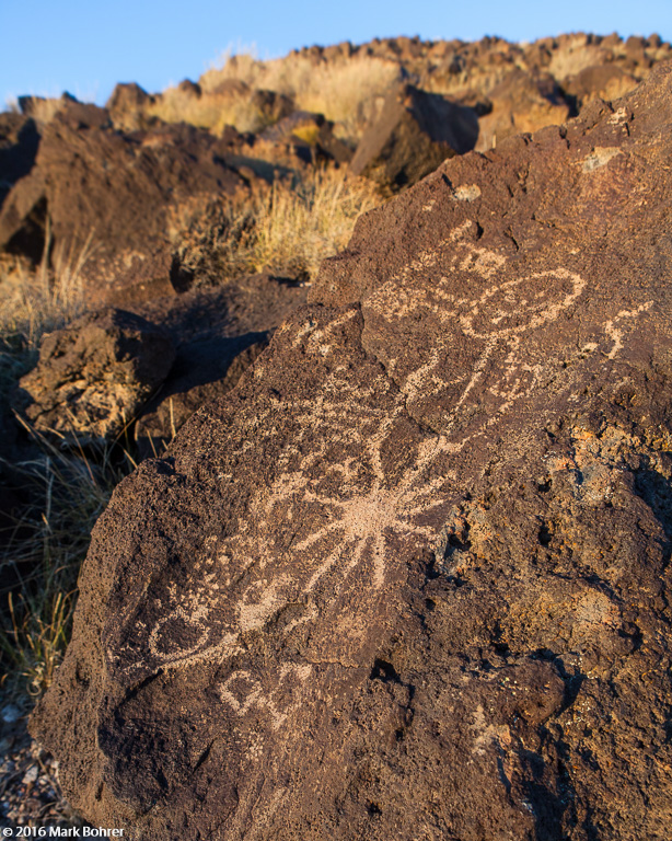 Mesa Prieta sunburst dancer petroglyph, Petroglyph National Monument
