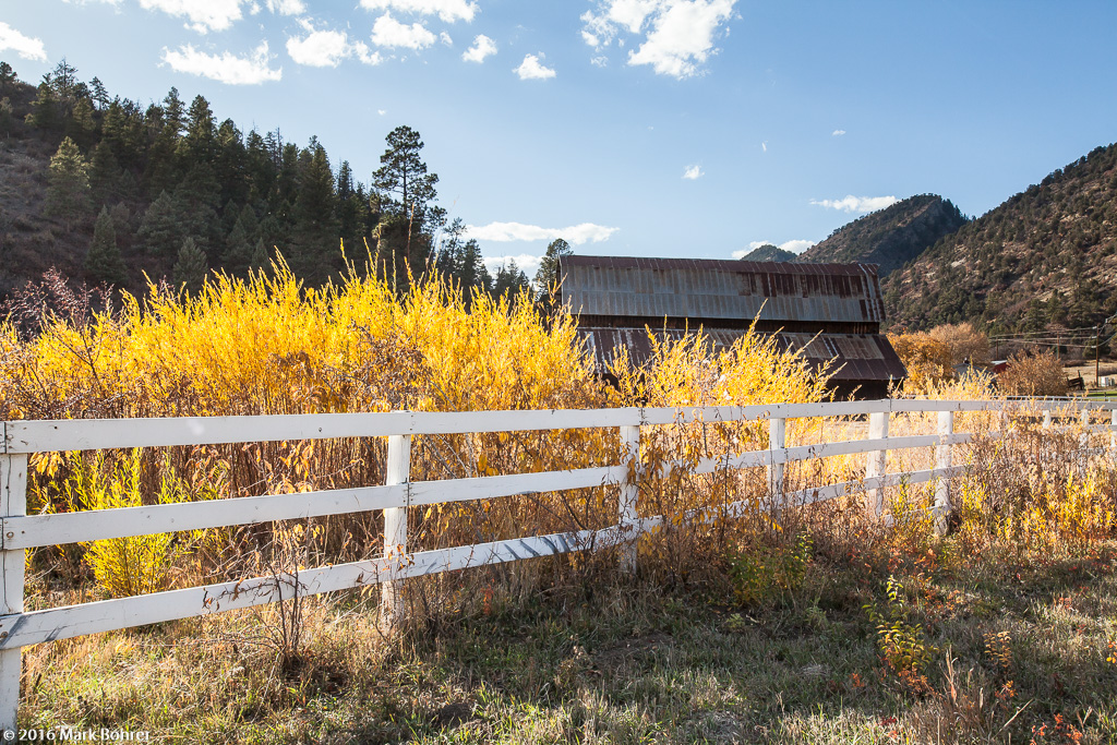 Barn and low-hanging color near Chimney Rock, Colorado