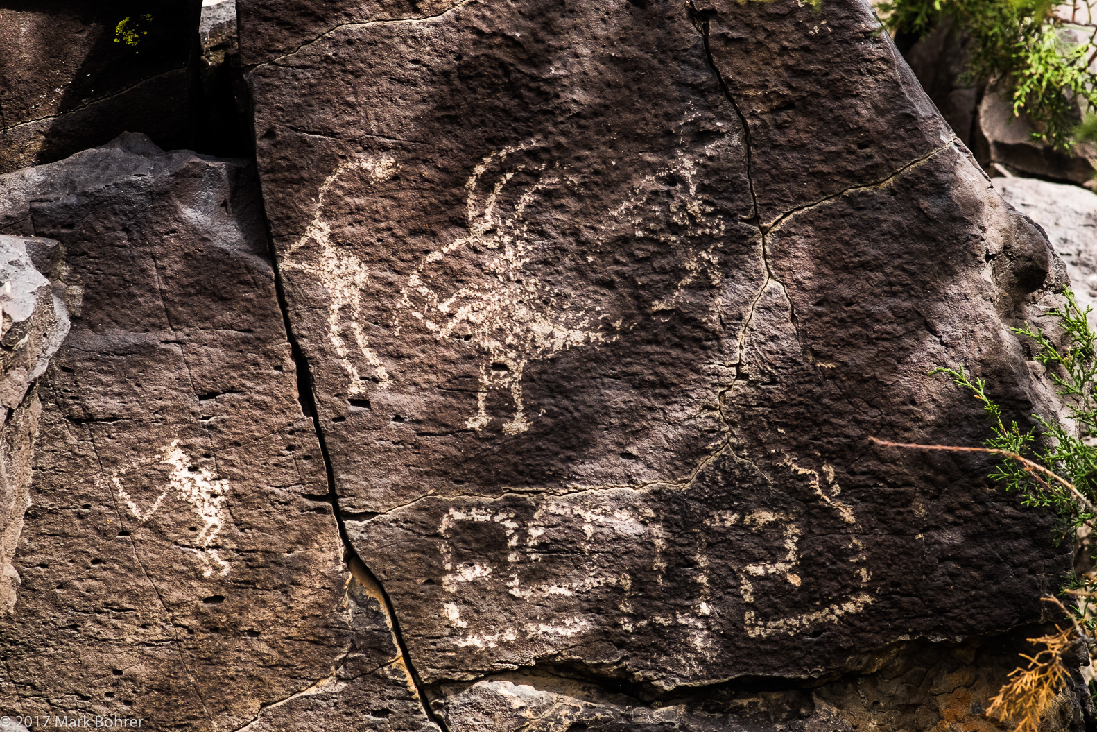 Kokopellis in the shade - La Cieneguilla Petroglyph Site