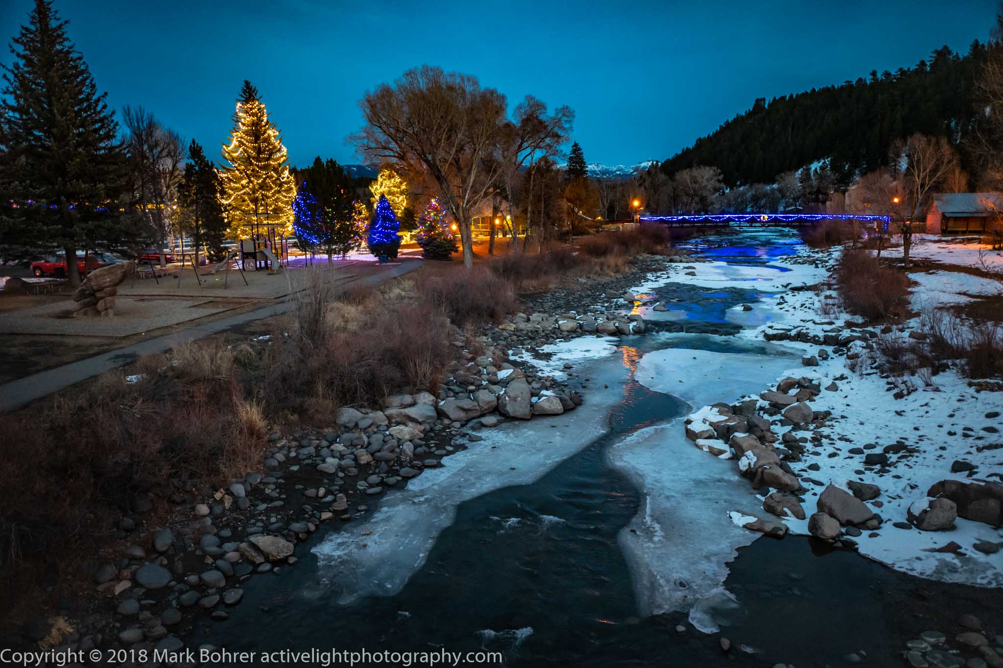 Holiday lights and San Juan River, Pagosa Springs, CO